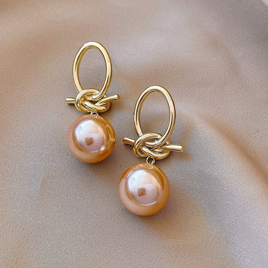 Champagne Pearl Drop Earrings with Knot Detail in Gold Tone