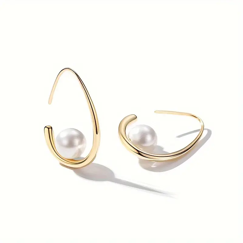 Asymmetrical White Pearl Drop Earrings with Curved Gold-Tone Setting