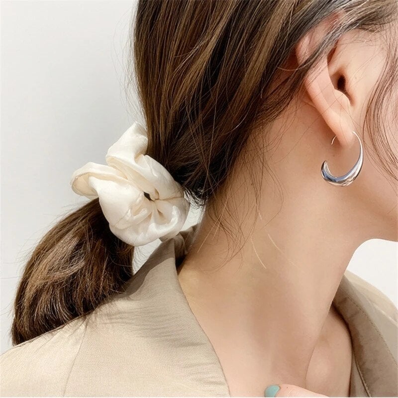 Luxurious Earrings Made of Gold and Silver