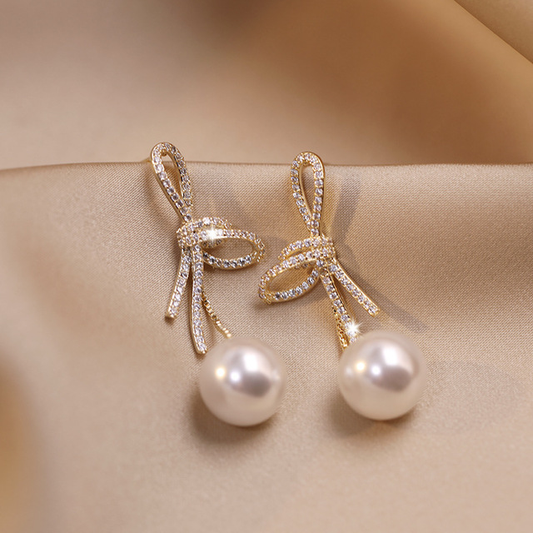 Crystal Bow Pearl Drop Earrings in Gold Tone