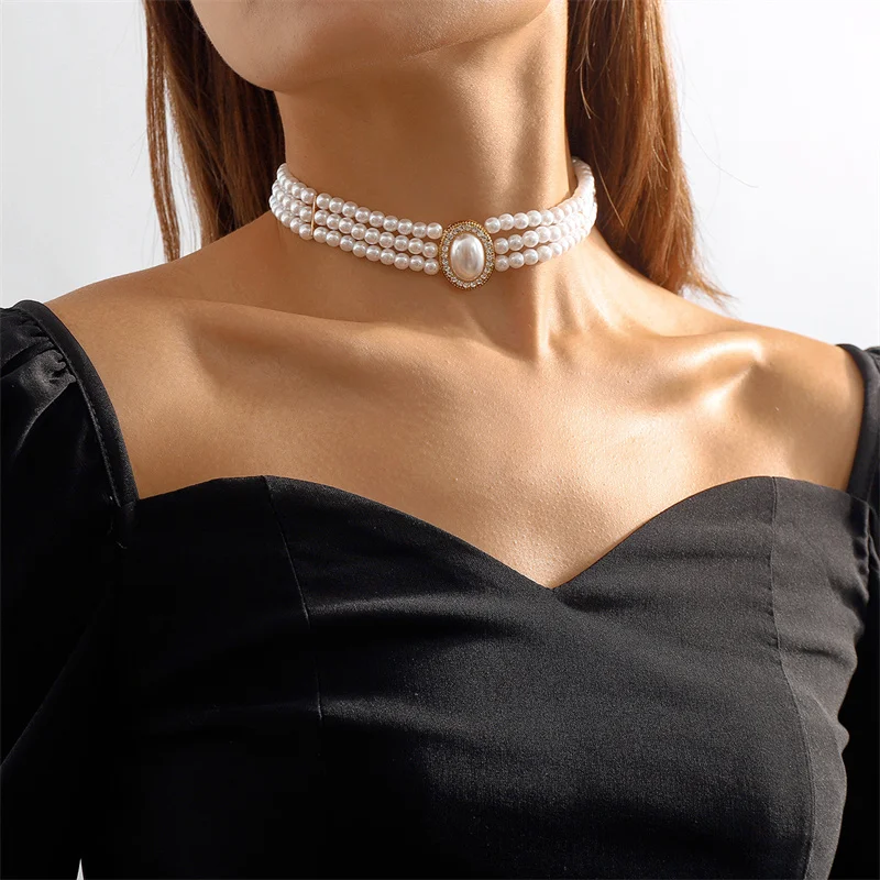 Triple-Strand Pearl Choker Necklace with Oval Rhinestone Centerpiece in Gold-Tone Setting