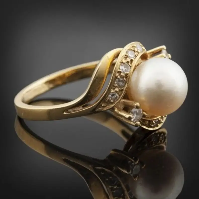 Pearl and Diamond Halo Ring with Curved Gold-Tone Band